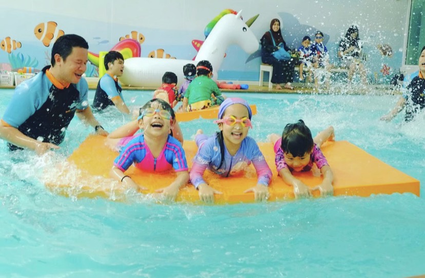 Kids enjoying swimming lessons
