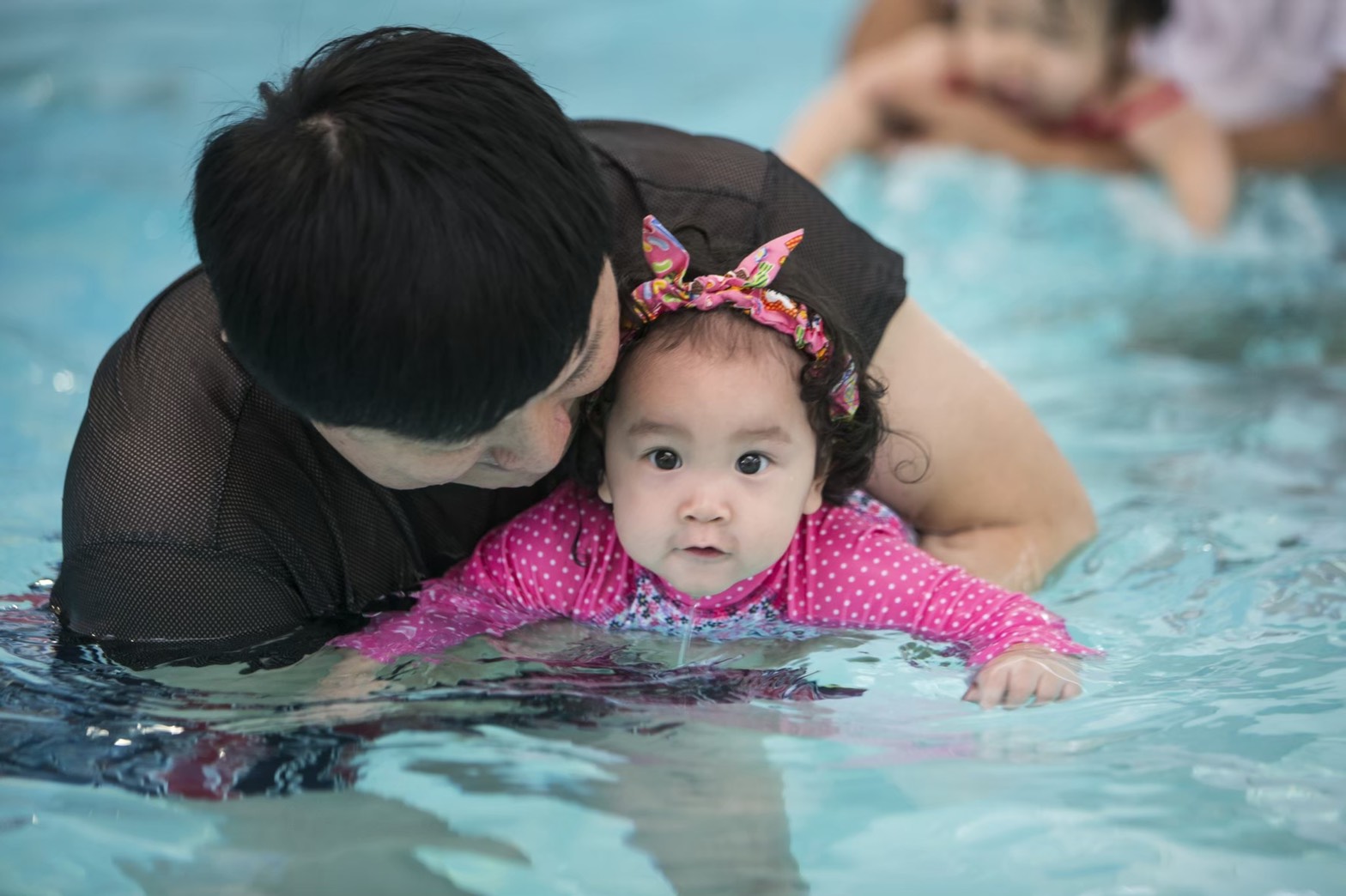 Baby learn how to swim in bangkok