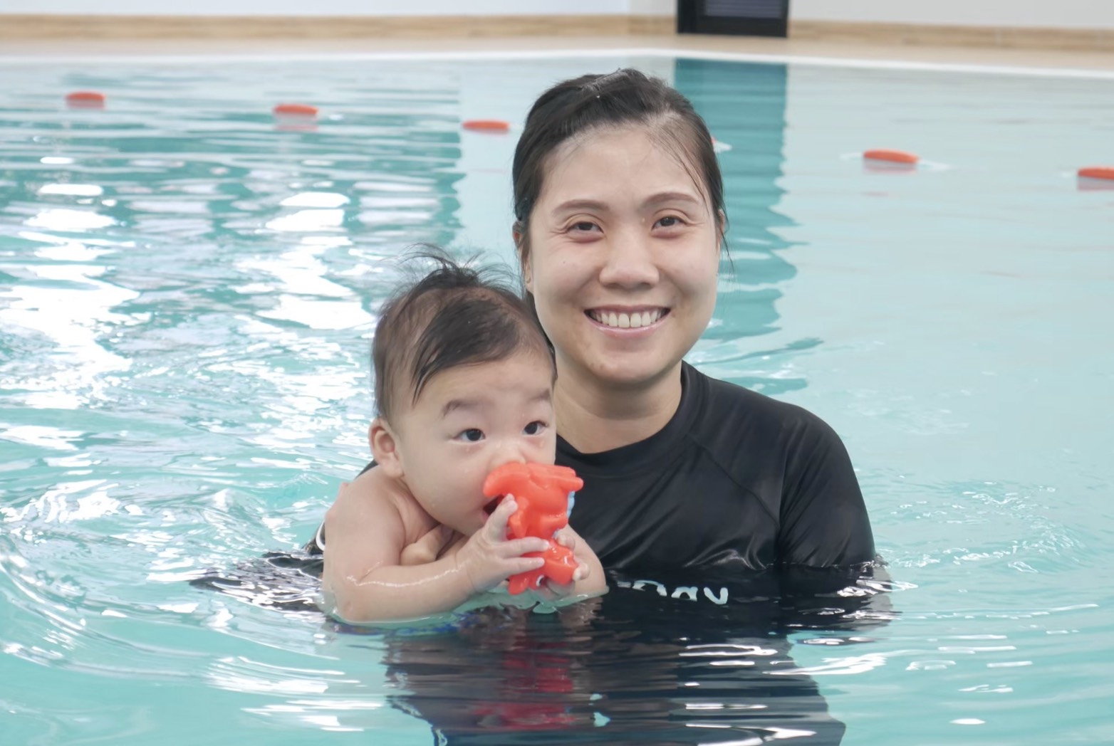 baby learning how to swim